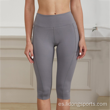 Pantalones de yoga de mujer cómodos leggings de gimnasio transpirable